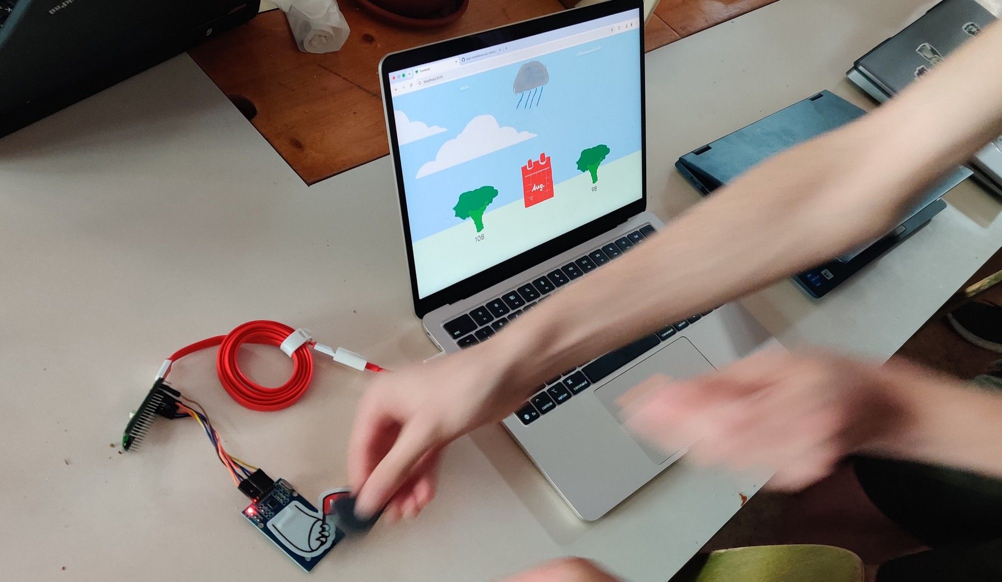 A person playing the broccoli game at Hack Club Horizons Europa